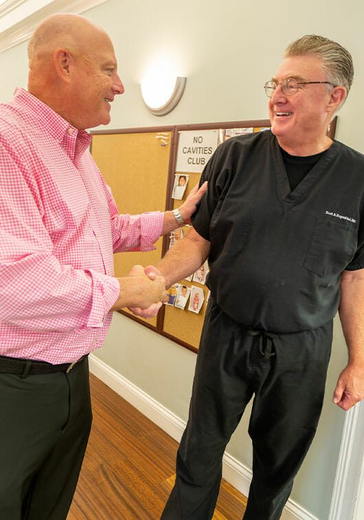 Dr. Rupenthal greeting a patient